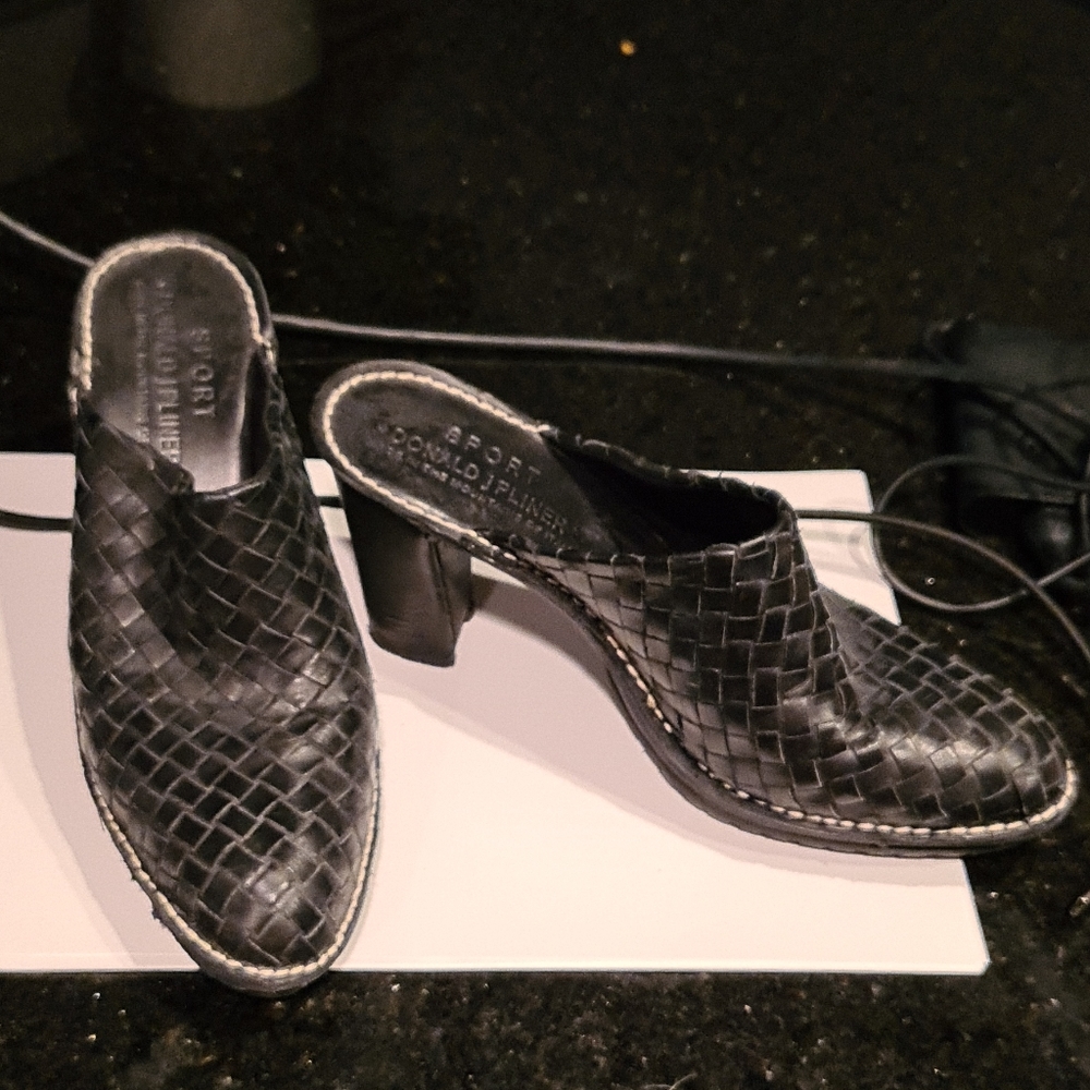 Black woven leather mules